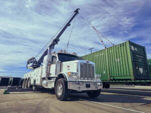 All American Towing Heavy Duty Wrecker Rotator Lifting Shipping Container in San Antonio